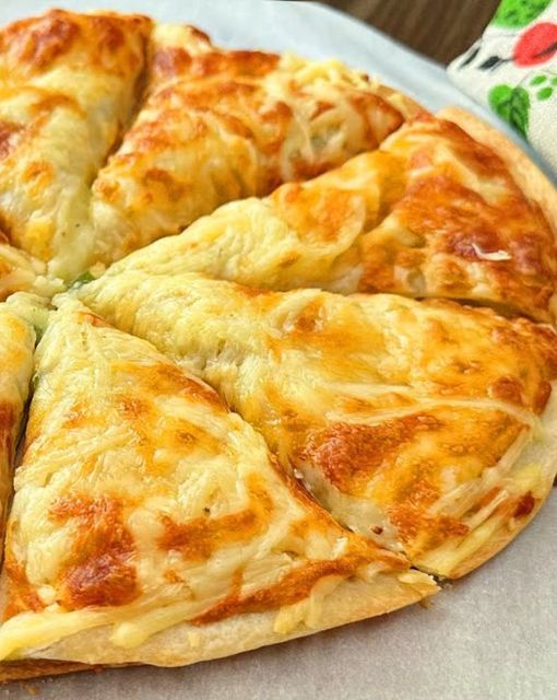 Cheesy Potato and Green Pea Tortilla Bake